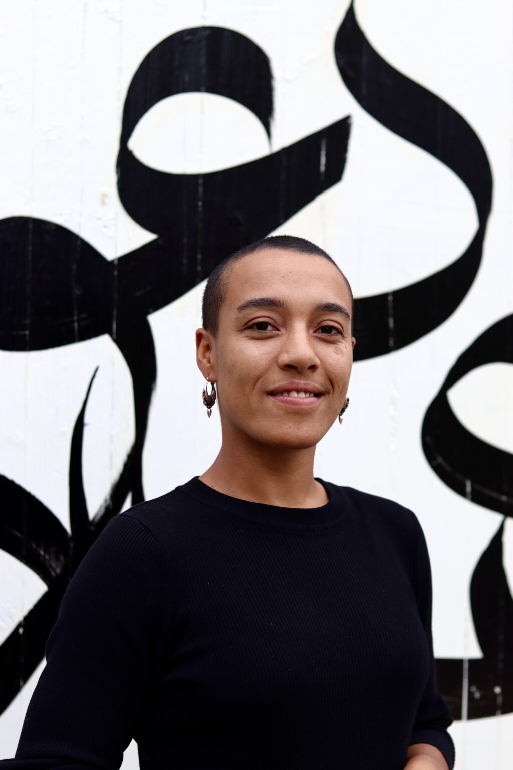 Trainer en acteur Aisha Tusa